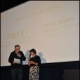  Catherine Millet et le distributeur du film français Hors Satan lors de la remise du prix Saint-Germain à Paris le 18 janvier 2012 
 &nbsp; 