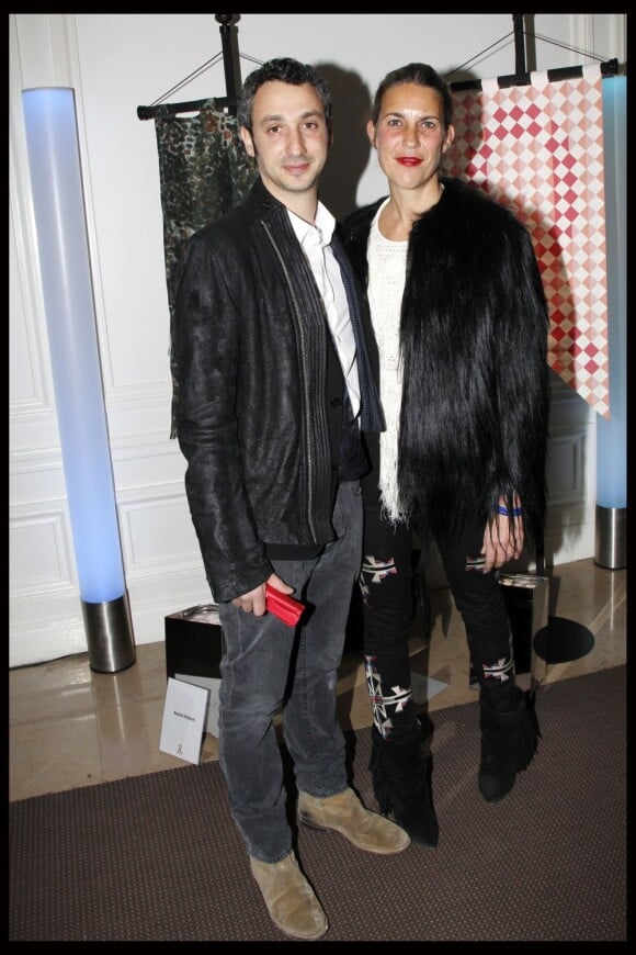 Le couple de créateurs Jérôme Dreyfuss et Isabel Marant au dixième Dîner De La Mode contre le Sida à Paris, le 26 janvier 2012.