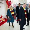 Le prince Charles et Camilla Parker Bowles étaient de retour à Tottenham le 9 février 2012, dans la joie, six mois après être venus dans de plus tristes circonstances, suite aux émeutes meurtrières d'août 2011.