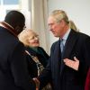 Le prince Charles et Camilla Parker Bowles étaient de retour à Tottenham le 9 février 2012, dans la joie, six mois après être venus dans de plus tristes circonstances, suite aux émeutes meurtrières d'août 2011.