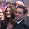 Carla Bruni-Sarkozy et Nicolas Sarkozy fendent la foule réunie au Parc Chanot à Marseille, le 19 février 2012.