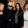 Karl Lagerfeld très bien entouré lors de l'inauguration de la boutique Chanel au 51 avenue Montaigne à Paris.