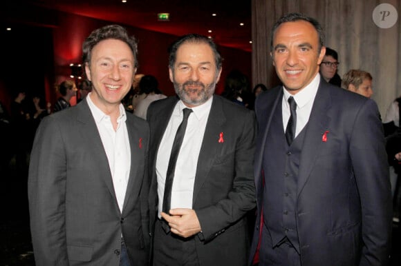 Denis Olivennes, Stéphane Bern et Nikos lors de la soirée de lancement du Sidaction 2012, à Paris, le 12 mars 2012