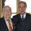 Michel Duchaussoy et Frédéric Mitterrand, en juillet 2011 à Paris.