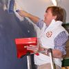 Le prince Willem-Alexander et la princesse Maxima des Pays-Bas ont participé à la rénovation des locaux du club de scout Satoko Kitahara, le 16 mars 2012, dans le cadre de la Journée du bénévolat.