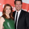 Alyson Hannigan enceinte, aux côtés de son mari Alexis Denisof, à l'avant-première d'American Pie 4 à Los Angeles, le 19 mars 2012.