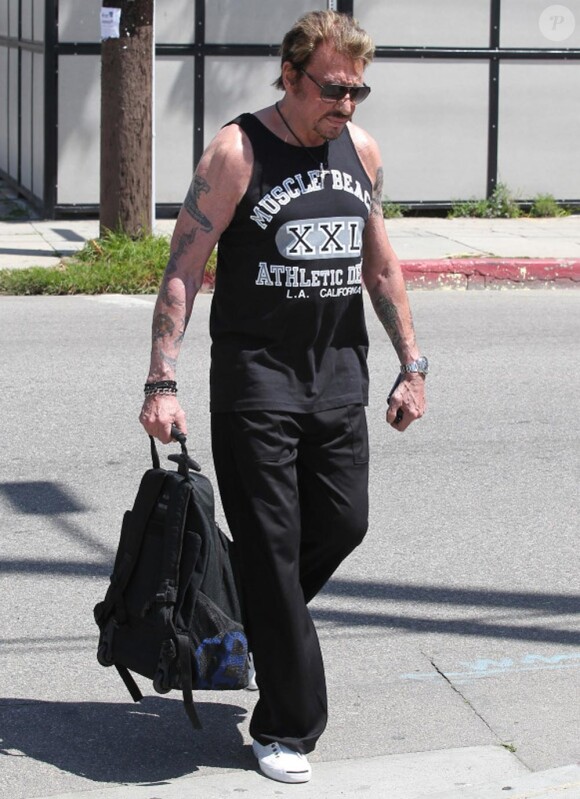 Johnny Hallyday va à la salle de sport pour être en pleine forme pour ses concerts dont le premier aura lieu à LA le 24 Avril 2012. Ce mec là, il est terrible !