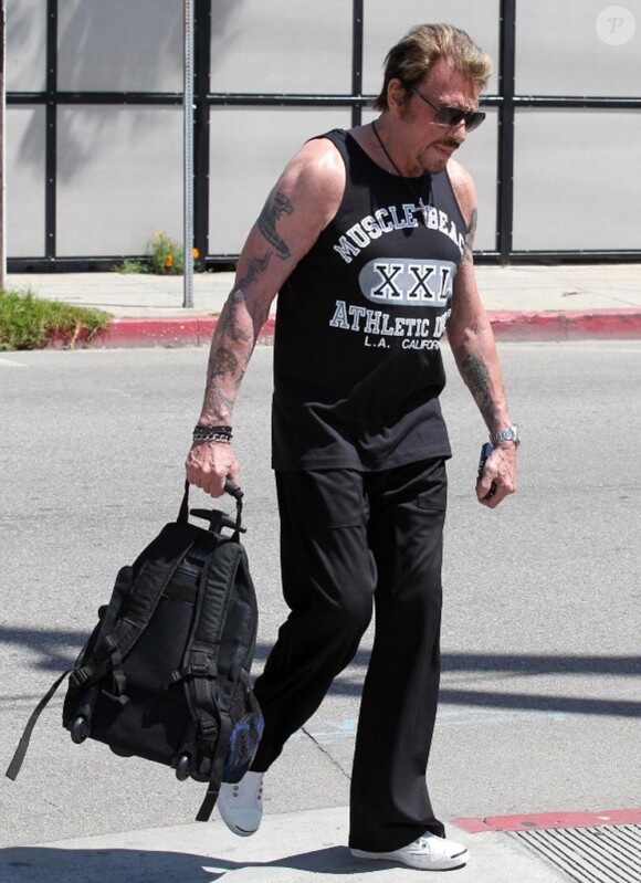 Johnny Hallyday va à la salle de sport pour être en pleine forme pour ses concerts dont le premier aura lieu à LA le 24 Avril 2012. Ce mec là, il est terrible !