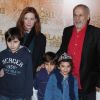 Francis Perrin, sa femme Gersende et leurs trois enfants, le 1er avril 2012 à Paris