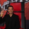 Carson Daly sur l'un des fameux fauteuils de The Voice lors d'un évènement presse NBC, à New York, le 16 mai 2011.