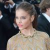 Barbara Palvin, ravissante dans sa robe Valentino, foule le tapis rouge du Palais des Festivals pour la projection du film Lawless. Cannes, le 19 mai 2012.