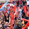 Loulou Nicollin, sa crête et ses joueurs du Montpellier HSC paradent dans les rues de la ville le 21 mai 2012 après leur titre de champion de France de Ligue 1 acquis la veille