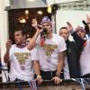 Loulou Nicollin, sa crête et ses joueurs du Montpellier HSC paradent dans les rues de la ville le 21 mai 2012 après leur titre de champion de France de Ligue 1 acquis la veille