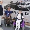 Le prince Albert et Charlene sont allés rencontrer des personnes handicapées dans le paddock du Grand Prix de Monaco le 26 mai 2012
