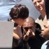 Kim Kardashian et Kanye West sur un shooting dans le quartier de China Town, à Los Angeles, le 13 mai 2012.