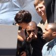 Kim Kardashian et Kanye West sur un shooting dans le quartier de China Town, à Los Angeles, le 13 mai 2012.