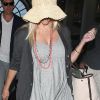 Reese Witherspoon et son mari Jim Toth à l'aéroport de Los Angeles le 10 juin 2012