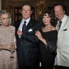 Roger Moore et son épouse, Joan Collins et son mari au dîner du Club des Ambassadeurs, organisé à l'Hôtel de Paris à Monaco, le 12 juin 2012.