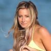 Ashley Tisdale, d'humeur festive pour son anniversaire, se dore la pilule sur une plage de Malibu, le 2 juillet 2012.