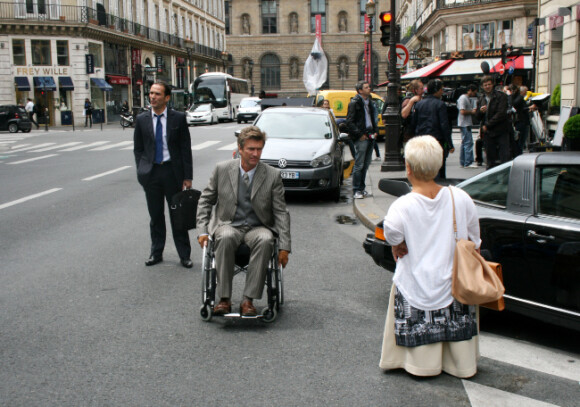 Mimie Mathy et Philippe Caroit sur le tournage de Joséphine, Ange gardien, à Paris, le 19 juin 2012
