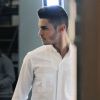 Baptiste Giabiconi pose dans le lookbook de la collection automne-hiver 2012-2013 shooté par Karl Lagerfeld
