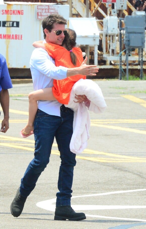 Retrouvailles entre Tom Cruise et sa fille Suri, à New York, le 20 juillet 2012.
