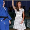 Séquence judo pour la duchesse de Cambridge. Kate Middleton et les princes William et Harry, ambassadeurs de la Team GB pour les JO de Londres 2012, inauguraient ensemble le projet de formation de coachs Coach Core, le 26 juillet 2012 au Bacon College de Rotherhithe (sud-est de Londres).