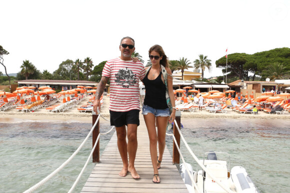 Christian Audigier, en vacances à St-Tropez avec sa compagne Nathalie Sorensen, le vendredi 27 juillet 2012.