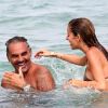 Epanouis, Christian Audigier et sa compagne Nathalie Sorensen sont en vacances à St-Tropez, le vendredi 27 juillet 2012.