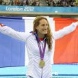 Camille Muffat, tout sourire après être devenue championne olympique du 400m nage libre lors des Jeux olympiques de Londres le 29 juillet 2012
