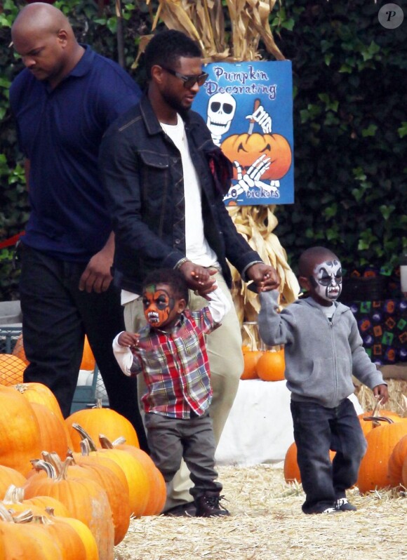 Usher et ses fils en 2010