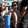 Katy Perry, protégée par ses amis, passe son après-midi au parc aquatique Raging Waters. San Dimas, le 12 août 2012.