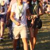 Louis du groupe One Direction avec sa petite amie Eleanor assistent au V Festival, le samedi 18 août 2012.