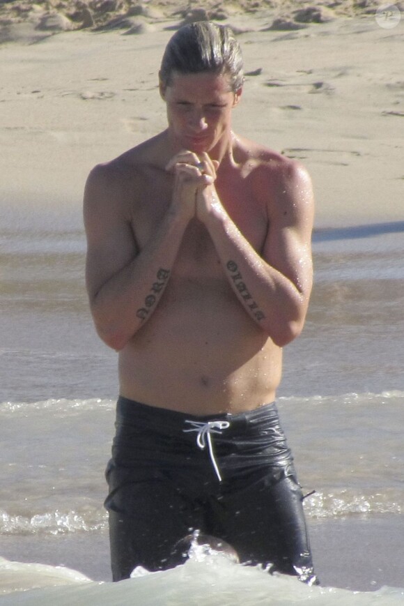 Fernando Torres en pleine prière le 2 septembre 2012 à Ibiza après la fessée reçue face à l'Atletico Madrid quelques jours avant