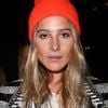 Dree Hemingway, habillée d'une veste Balmain et d'un bonnet orange, assiste au défilé Balmain printemps-été 2013. Paris, le 27 septembre 2012.