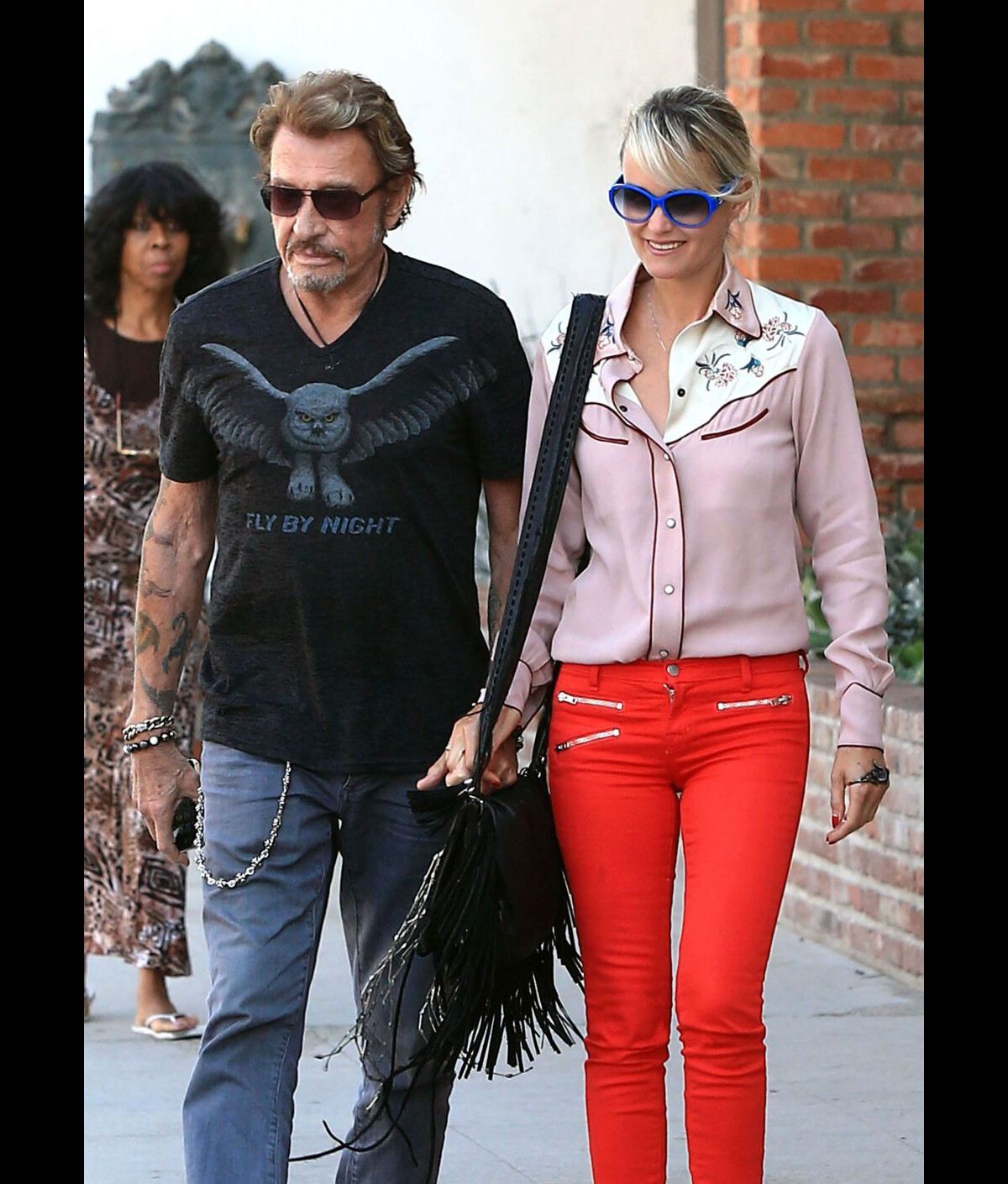 Photo : Johnny Hallyday et Laeticia dans le quartier de Santa Monica, le 27 septembre 2012