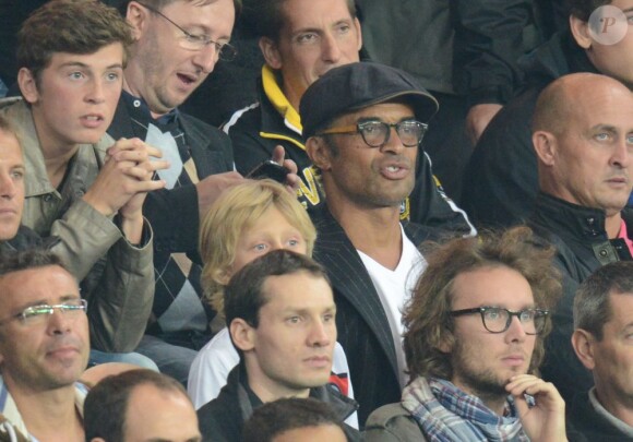 Yannick Noah et son fils Joalukas lors du match du PSG face au Dynamo Kiev le 18 septembre 2012 au Parc des Princes à Paris