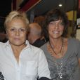 Muriel Robin et sa compagne Anne Le Nen, lors de la Générale du spectacle d'Alex Lutz, le 22 octobre à Paris.