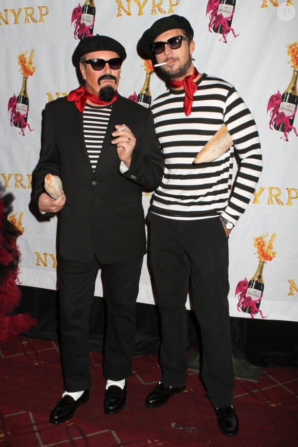 Michael Kors et son mari au bal annuel d'Halloween organisé par Bette Midler, à New York, le 31 octobre 2012.