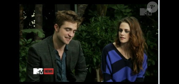 Kristen Stewart et Robert Pattinson lors de leur première interview donnée ensemble depuis "l'affaire" de tromperie en juillet dernier (MTV)