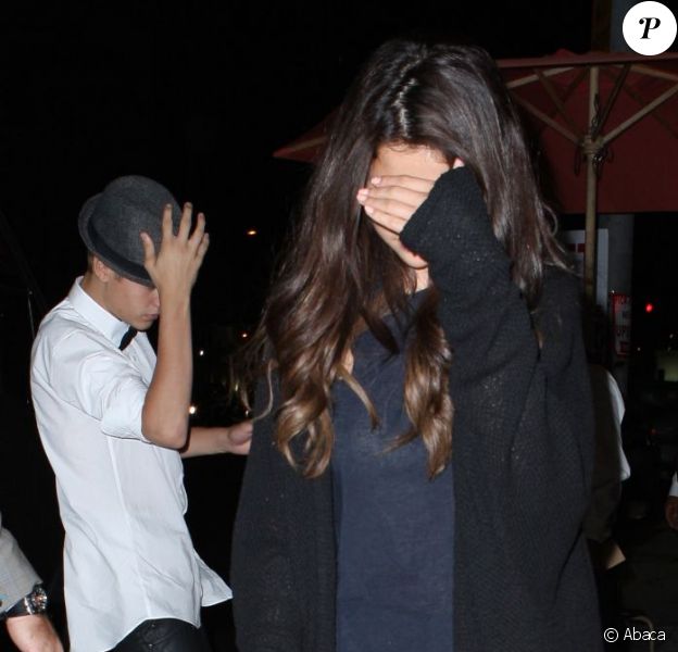 Selena Gomez et Justin Bieber sneak à Los Angeles, le 9 août 2012.