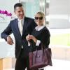 Reese Witherspoon et son mari et désormais papa Jim Toth, heureux et complices, le 14 novembre 2012 à Los Angeles.