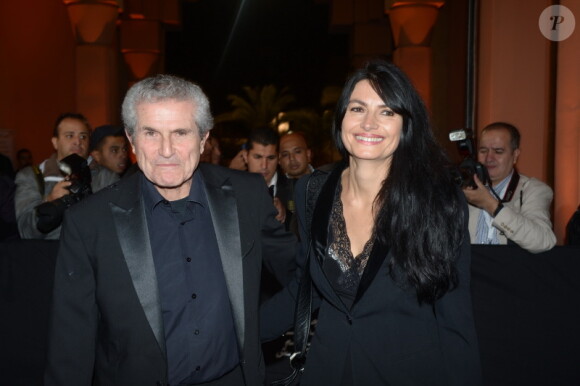 Claude Lelouch et sa compagne lors du Photocall du film "Touch of the Light" à l'occasion de l'ouverture du Festival International du Film de Marrakech 2012 le 30 Novembre 2012.