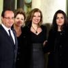 Valérie Trierweiler, François Hollande, la présidente du Brésil Dilma Rousseff et sa fille Paula Araujo lors d'un dîner d'Etat à l'Elysée, le 11 Decembre 2012.
