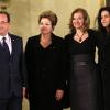 Valérie Trierweiler, François Hollande, la présidente du Brésil Dilma Rousseff et sa fille Paula Araujo lors d'un dîner d'Etat à l'Elysée, le 11 Decembre 2012.