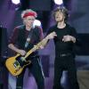 Mick Jagger et Keith Richards lors du concert de soutien aux victimes de l'ouragan Sandy, le 12 décembre 2012 à New York.