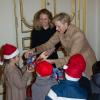 La princesse Charlene de Monaco était radieuse lors du Noël des enfants au palais princier, le 12 décembre 2012.