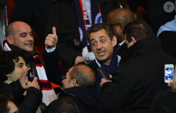 Nicolas Sarkozy heureux lors du match entre le PSG et Lyon le 16 décembre 2012 au Parc des Princes (victoire 1-0 du PSG) à Paris