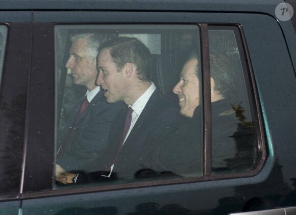 Le prince William et Lord Linley arrivant à Buckingham Palace pour le déjeuner de Noël organisé par la reine Elizabeth II, à Londres, le 19 décembre 2012