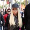 Nicki Minaj fait du shopping sur Rodeo Drive à Beverly Hills accompagnée de son garde du corps et de son bras droit Scaff Beezy. Le 20 décembre 2012.